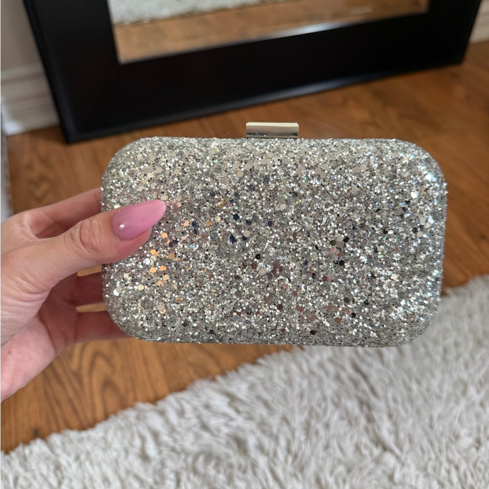 Express glitter clutch bag